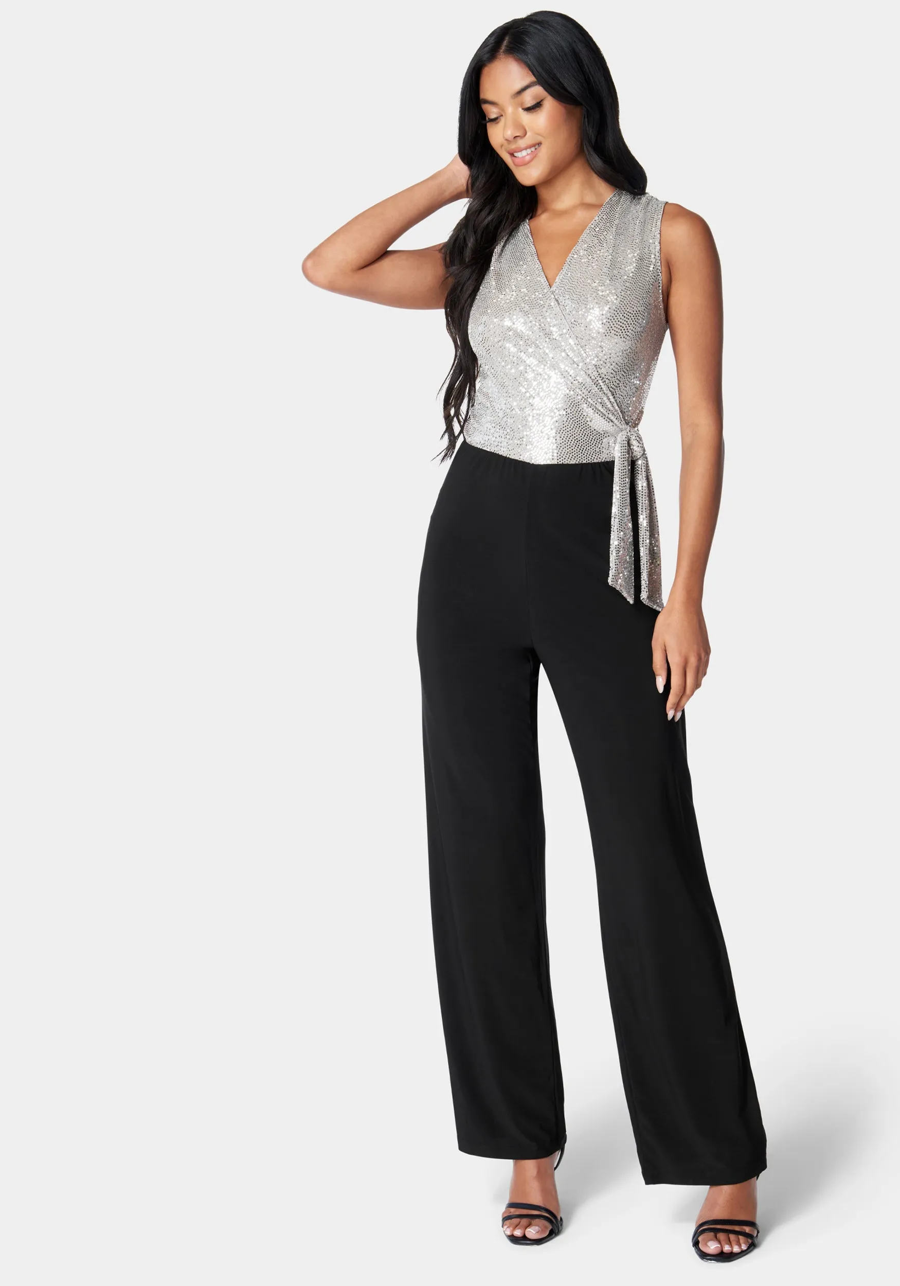 Disco Dot Wrap Tie Jumpsuit sold by Bebe