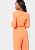 Tie Front Elastic Waist Jumpsuit sold by Bebe