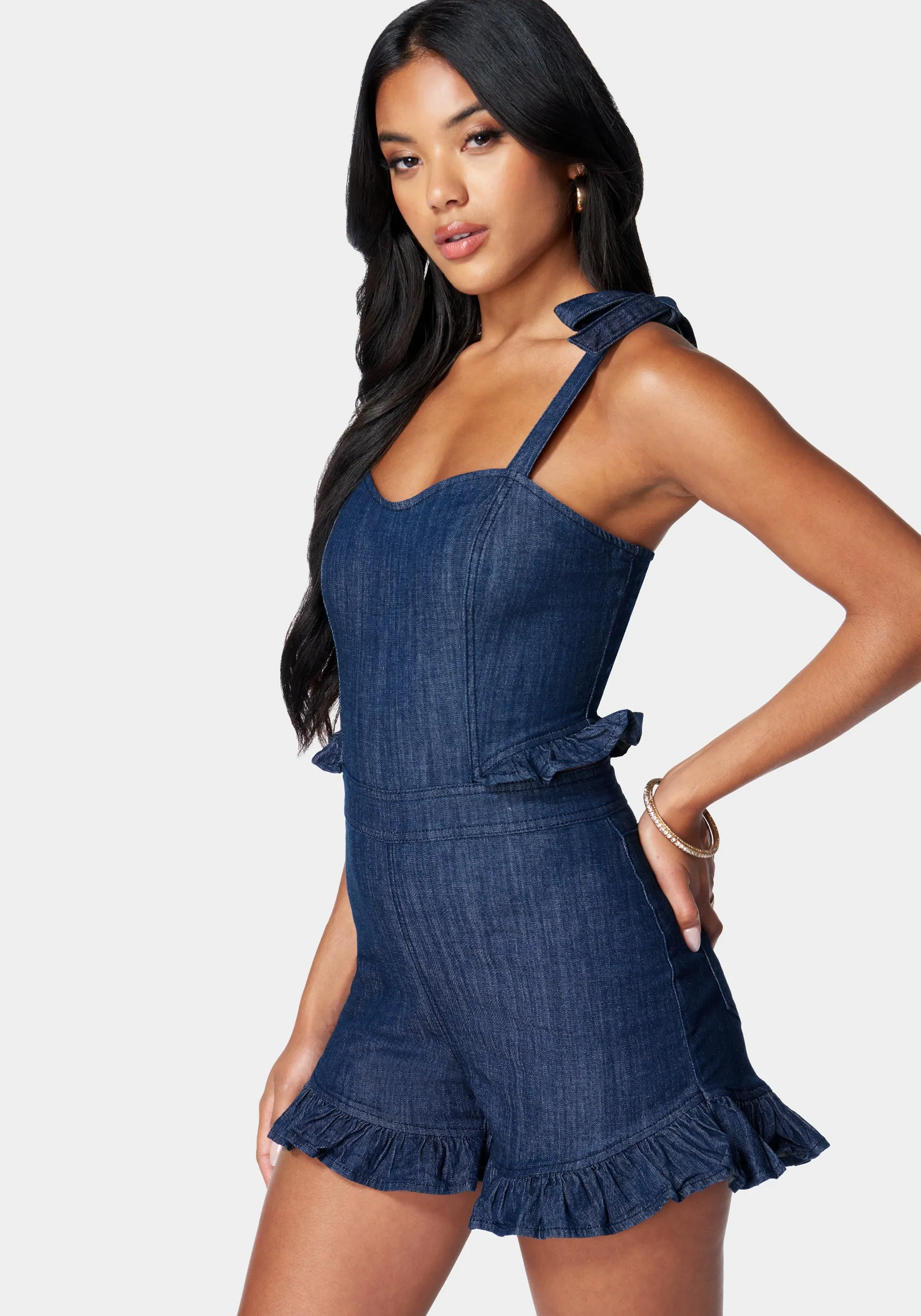 Tie Strap Ruffle Detail Denim Romper sold by Bebe