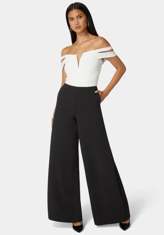 Off Shoulder Full Wide Leg Jumpsuit sold by Bebe