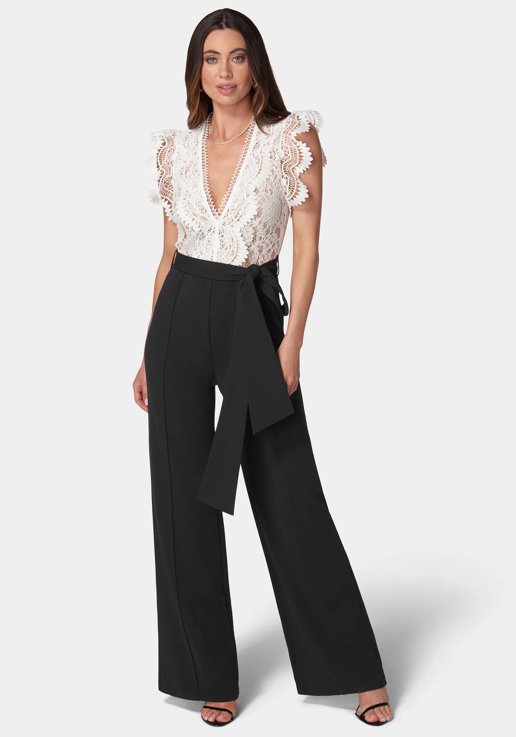 Ruffle Lace Jumpsuit sold by Bebe