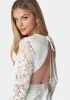 Open Back Lace Mini Dress sold by Bebe