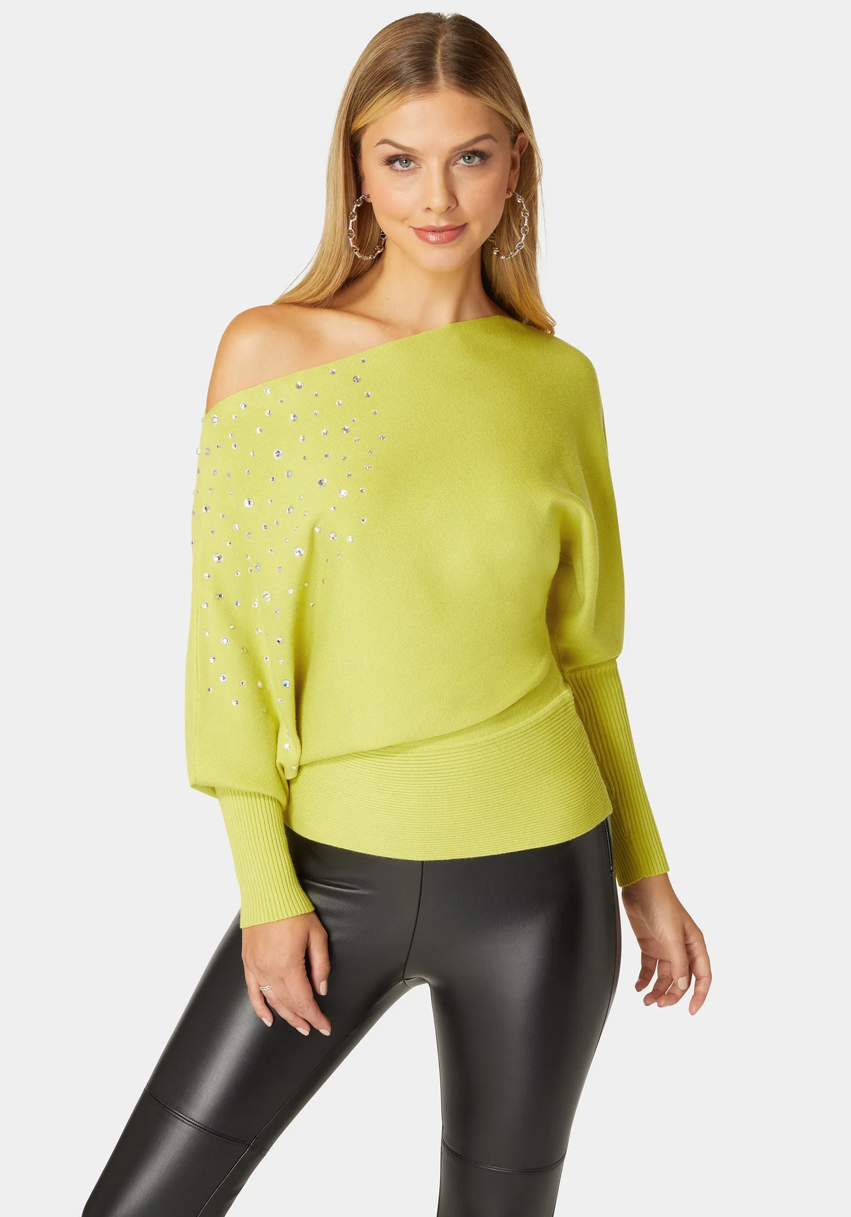 Off Shoulder Studded Dolman Sleeve Sweater sold by Bebe