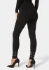 Natural Waist Grommet Detail Knit Legging sold by Bebe