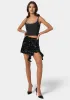 Mini Sequin Ruffle Slit Skort sold by Bebe