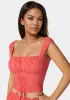 Eyelet Lace Up Corset sold by Bebe