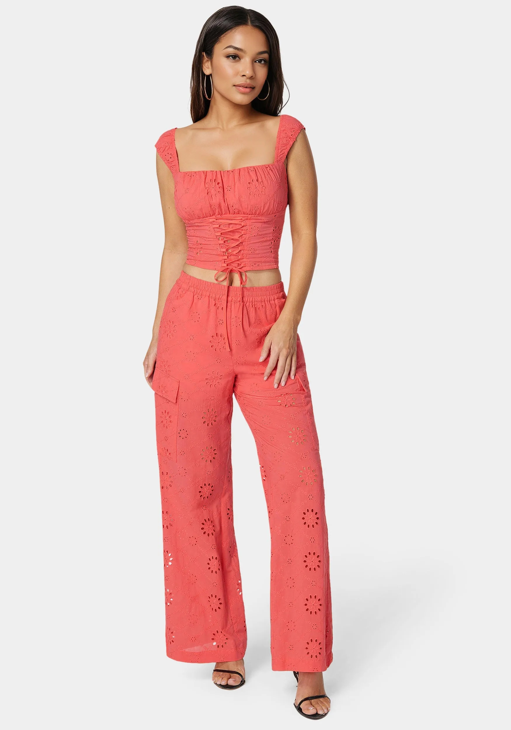 Eyelet Lace Up Corset sold by Bebe