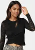 Lace Wrap Top sold by Bebe