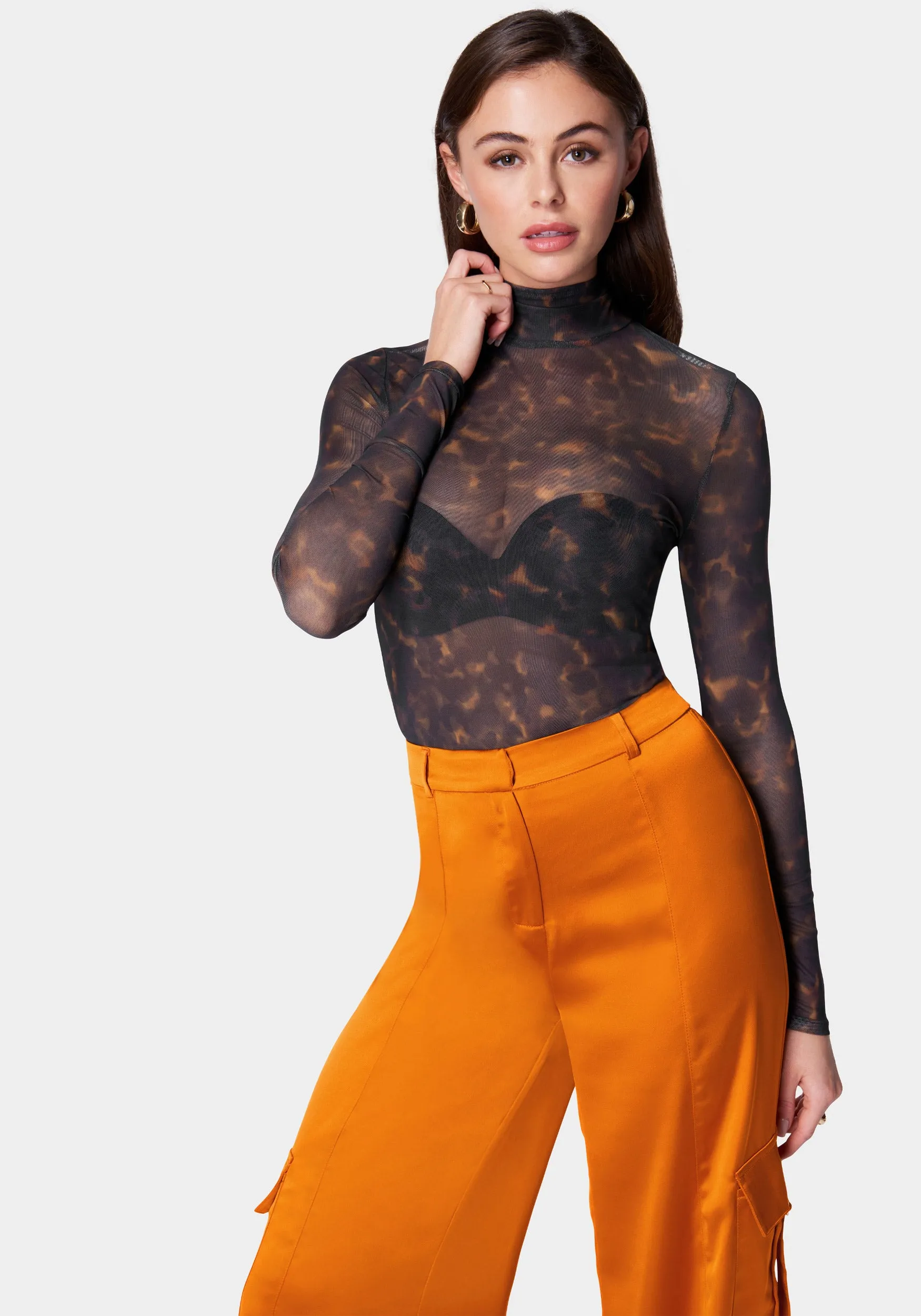 Mock Neck Printed Mesh Top sold by Bebe