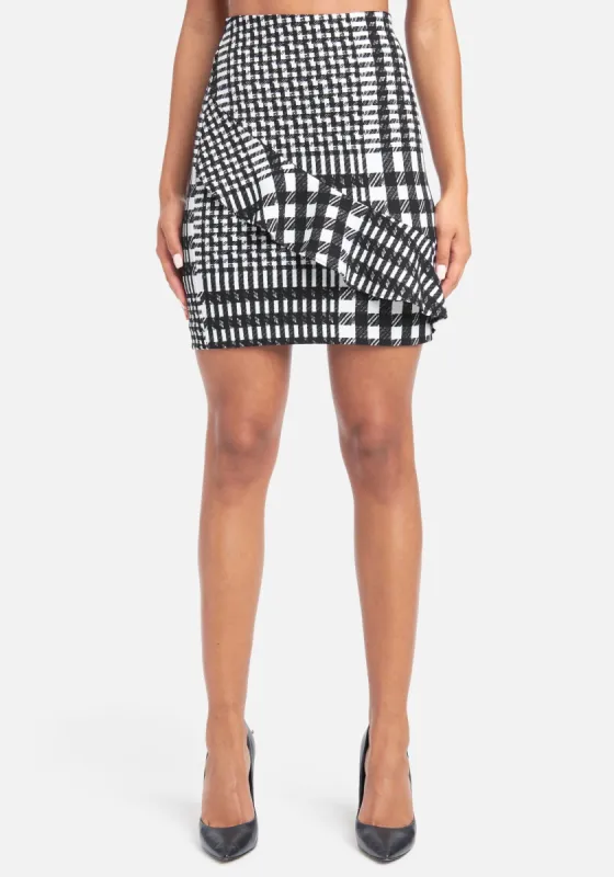 Houndstooth Ruffle Mini Skirt sold by Bebe