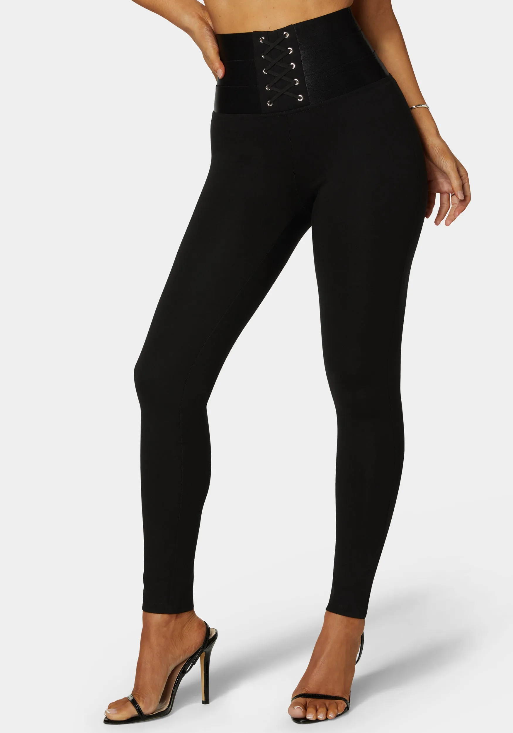 High Waisted Elastic Waistband Lace Up Legging sold by Bebe