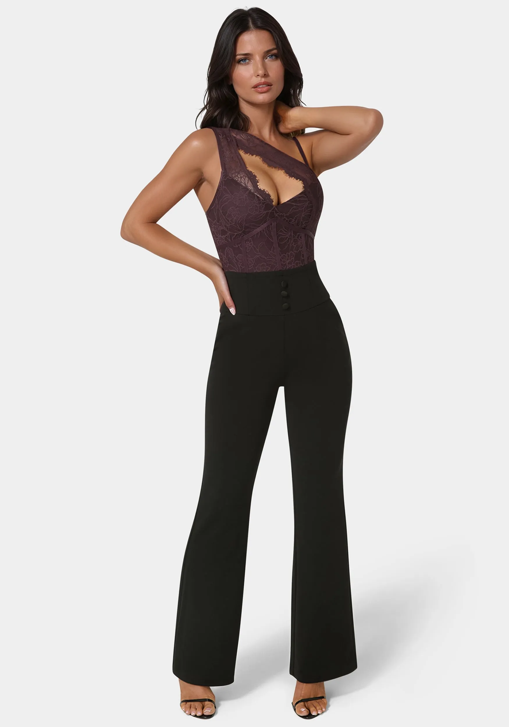 Asymmetric Fooler Lace Jumpsuit sold by Bebe