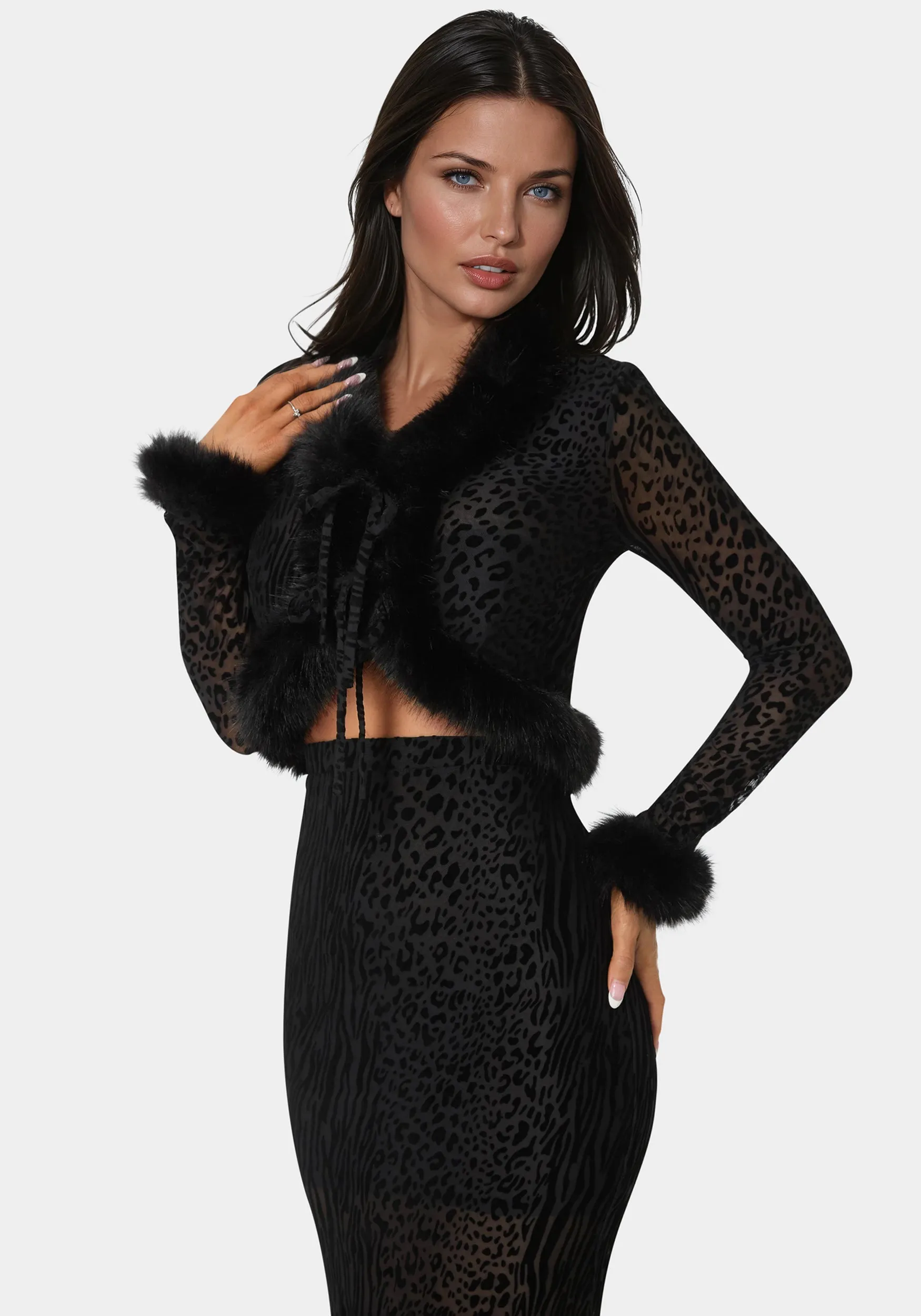 Animal Mesh Faux Fur Trim Long Sleeve Top sold by Bebe
