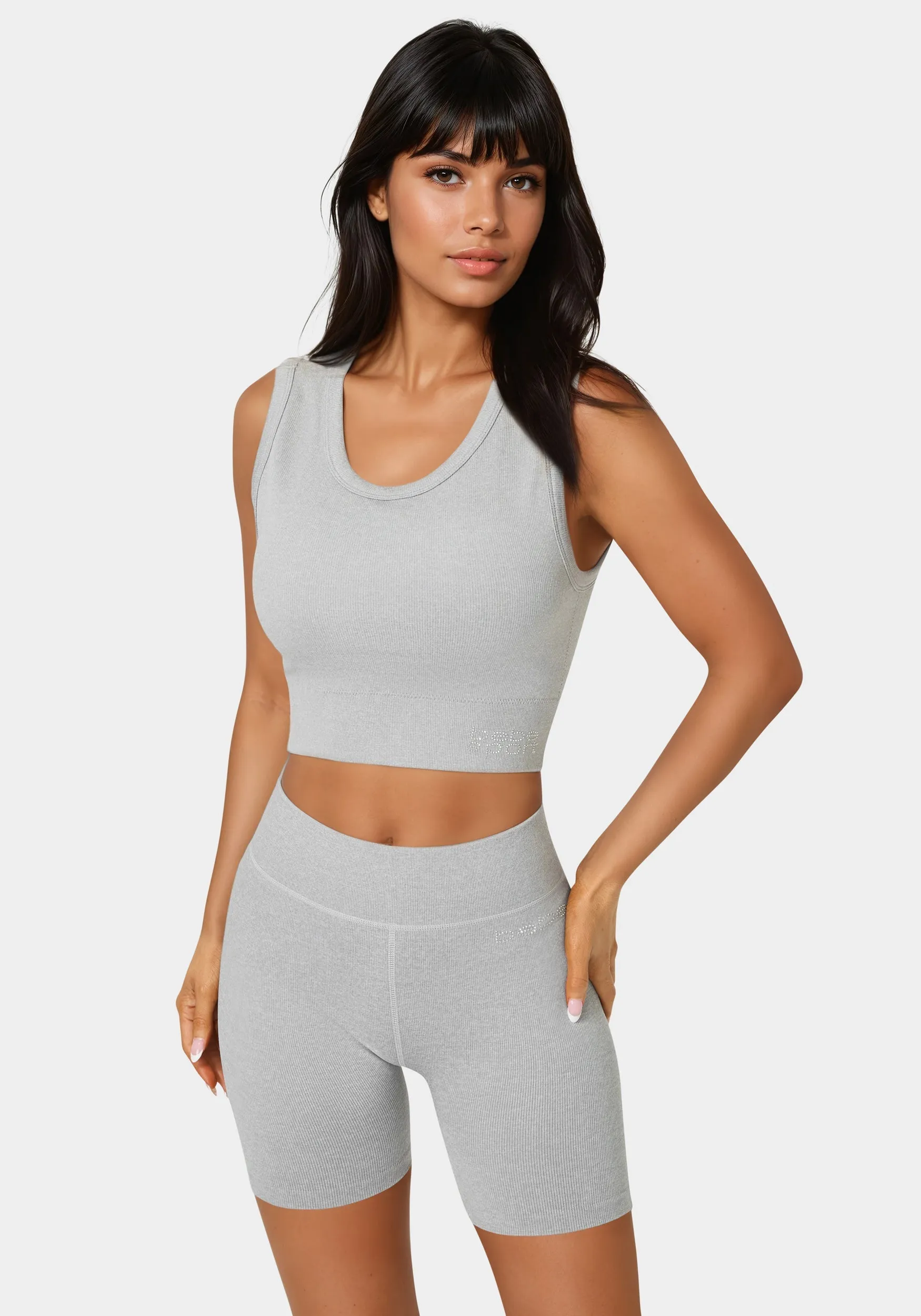 Double Layer Front Seamless Crop Tank sold by Bebe