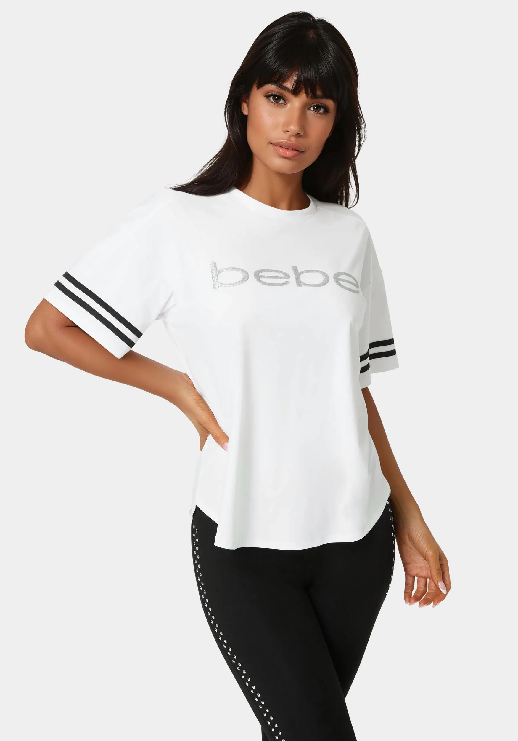 Curved Hem Active Top With Glitter Logo sold by Bebe