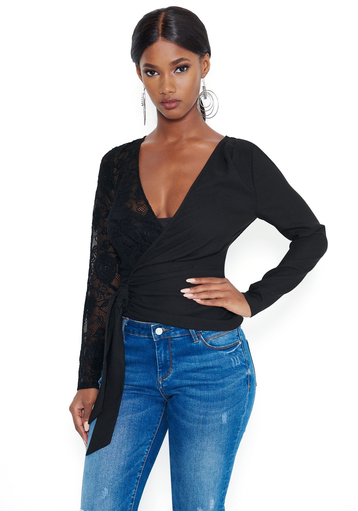 Mixed Wrap Top sold by Bebe