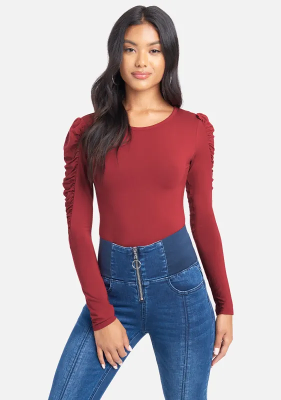 Ruched Shoulder Long Sleeve Top sold by Bebe