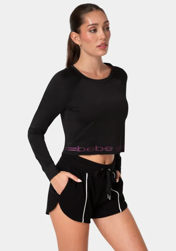 Bebe Sport Long Sleeve Laser Cut Top made by Bebe
