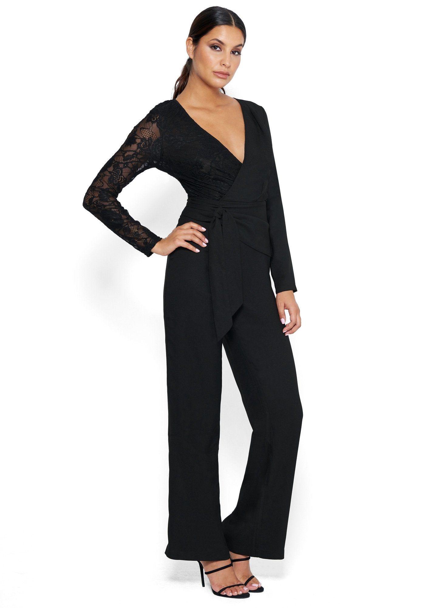Mixed Wrap Jumpsuit sold by Bebe