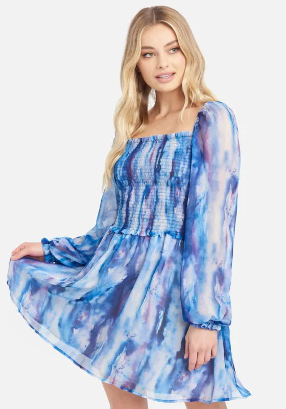 Printed Chiffon Smocked Flowy Dress sold by Bebe