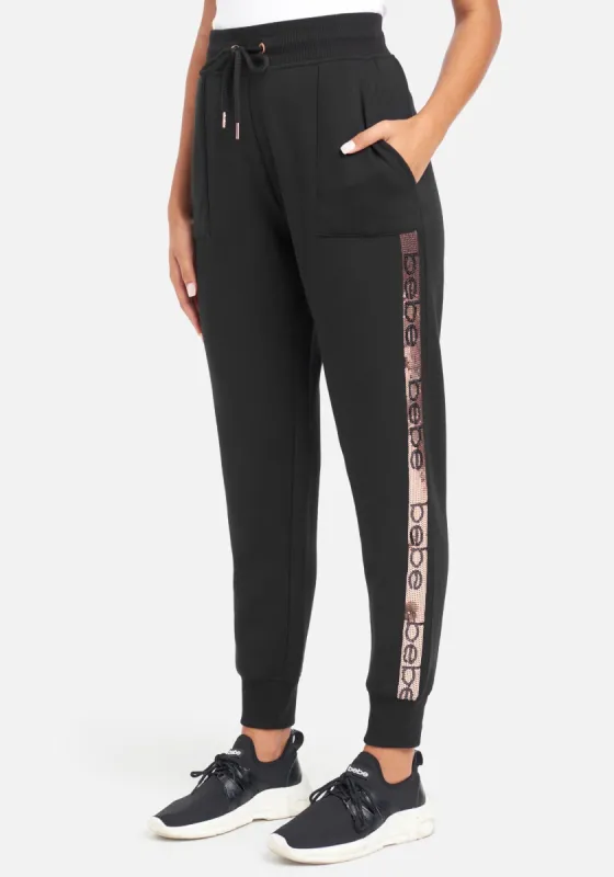Bebe Sport Sequin Stripe Jogger sold by Bebe