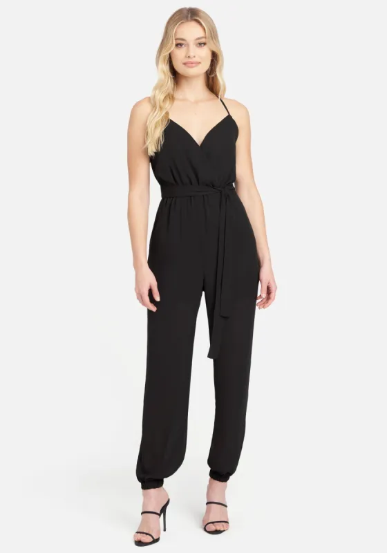 Smocked Cuff Woven Jumpsuit sold by Bebe