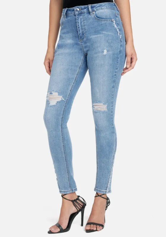 Light Wash Skinny Jeans sold by Bebe