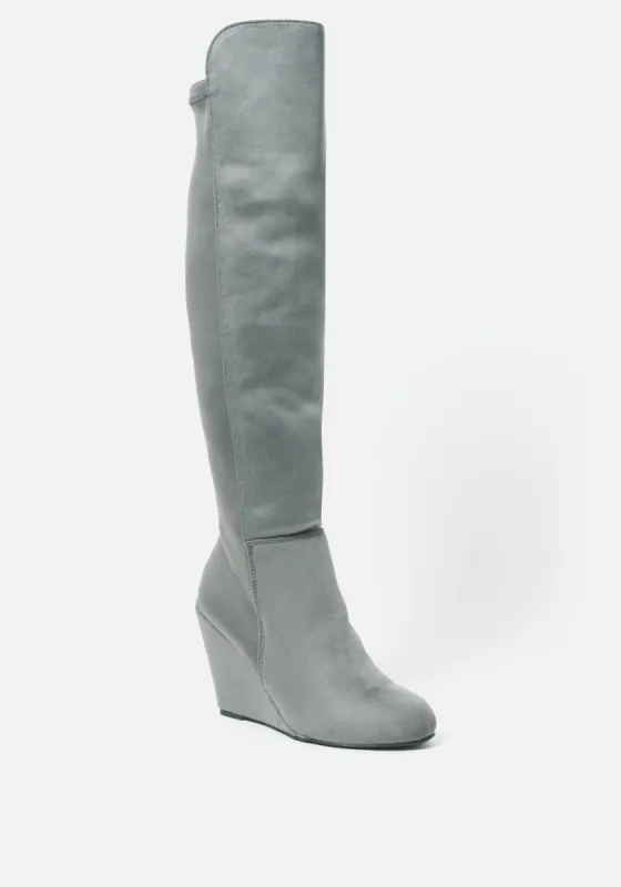 Houstyn Knee High  Boot Wedge sold by Bebe