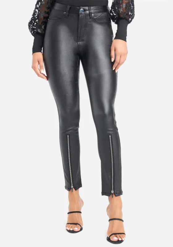 Coated Glitter Skinny Jeans sold by Bebe