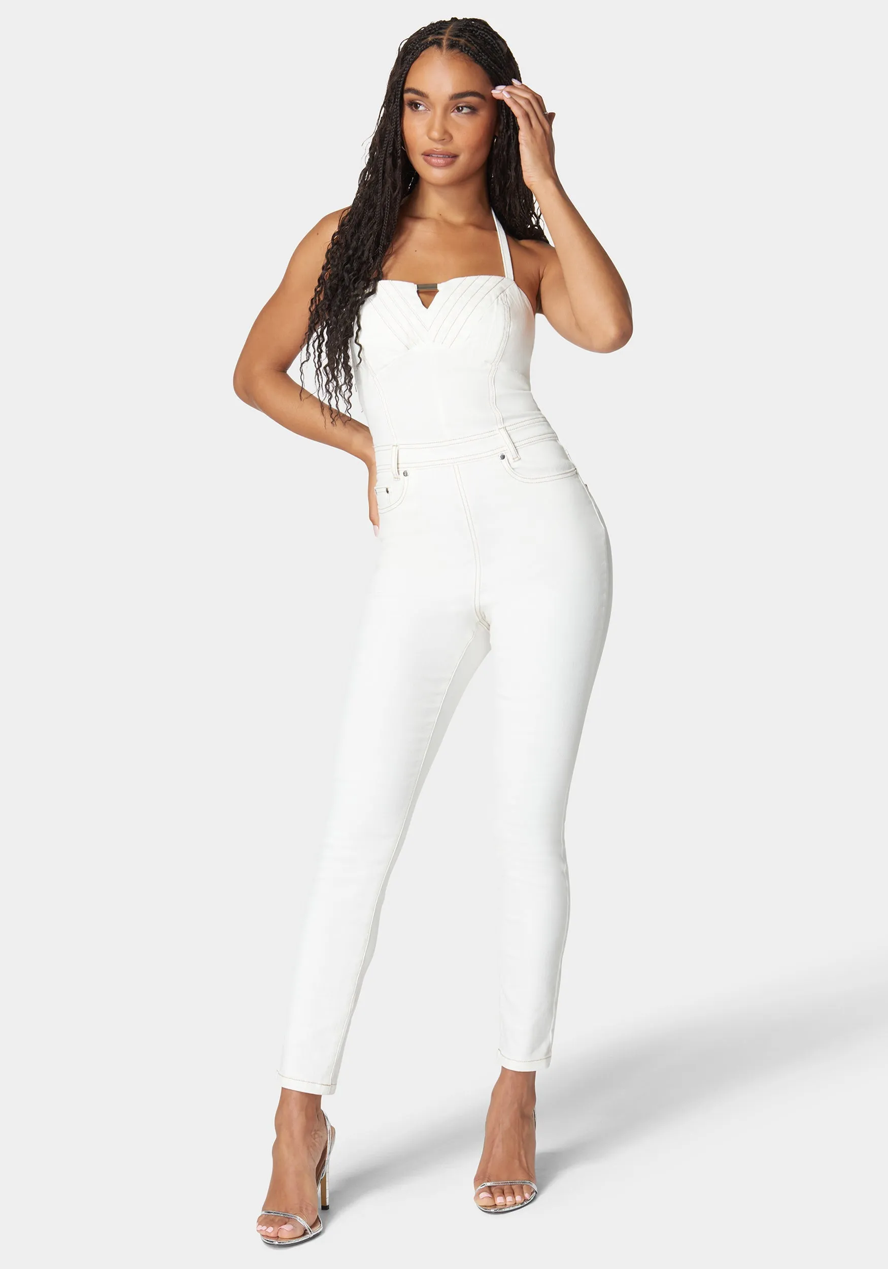 Halter Slim Leg Denim Jumpsuit sold by Bebe