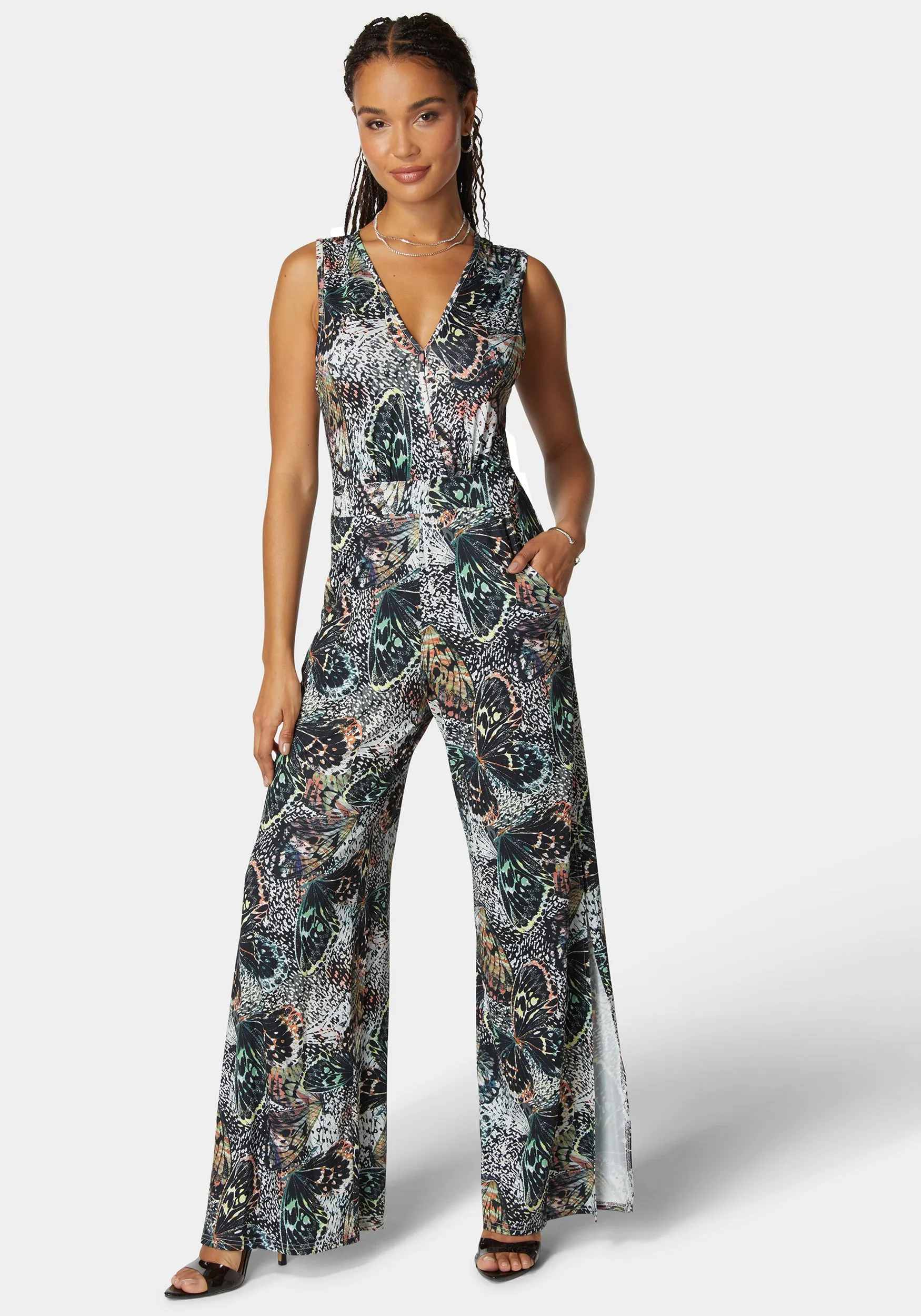 Printed Plunge Neck Jumpsuit sold by Bebe