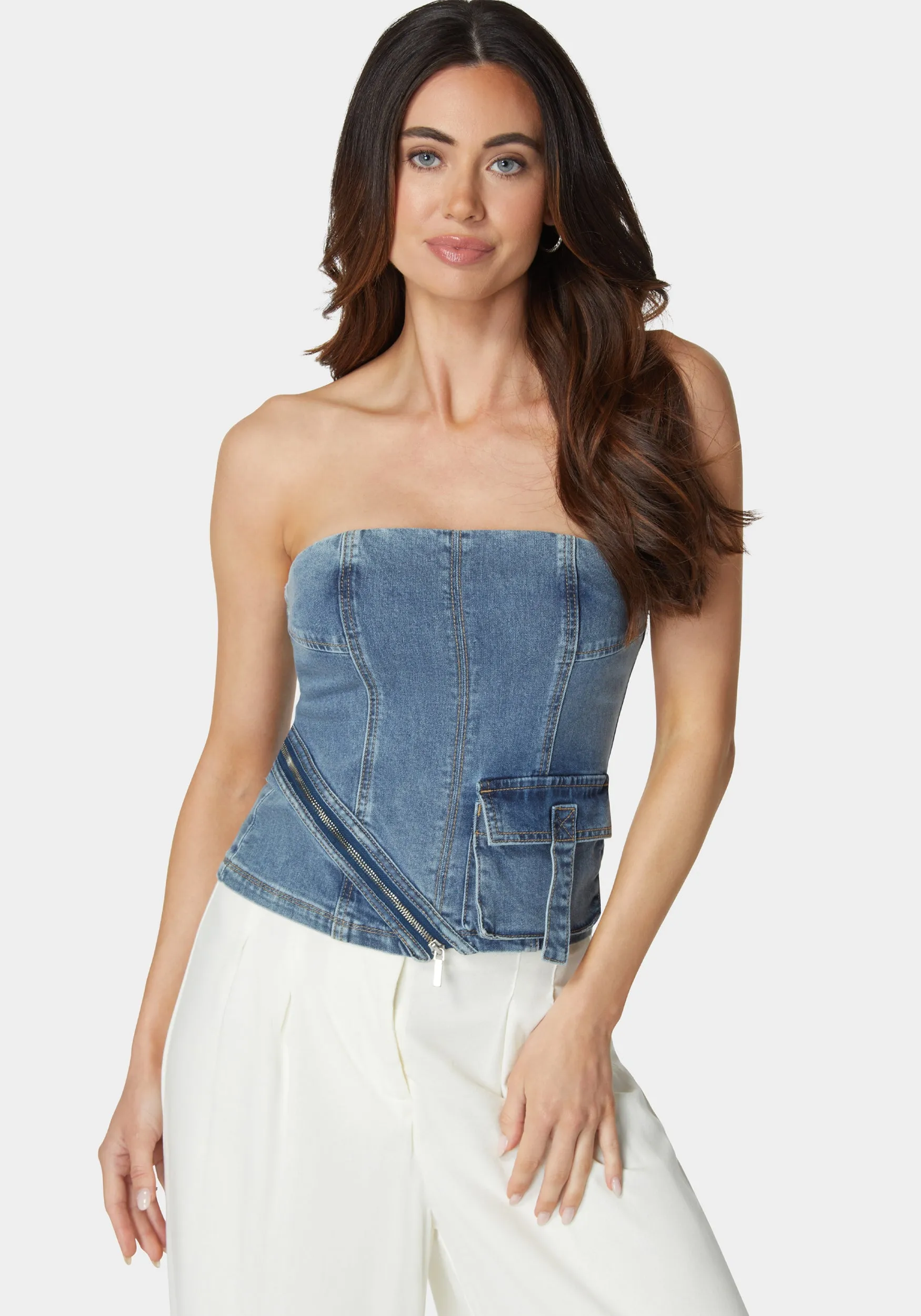 Zipper And Cargo Detail Denim Top sold by Bebe