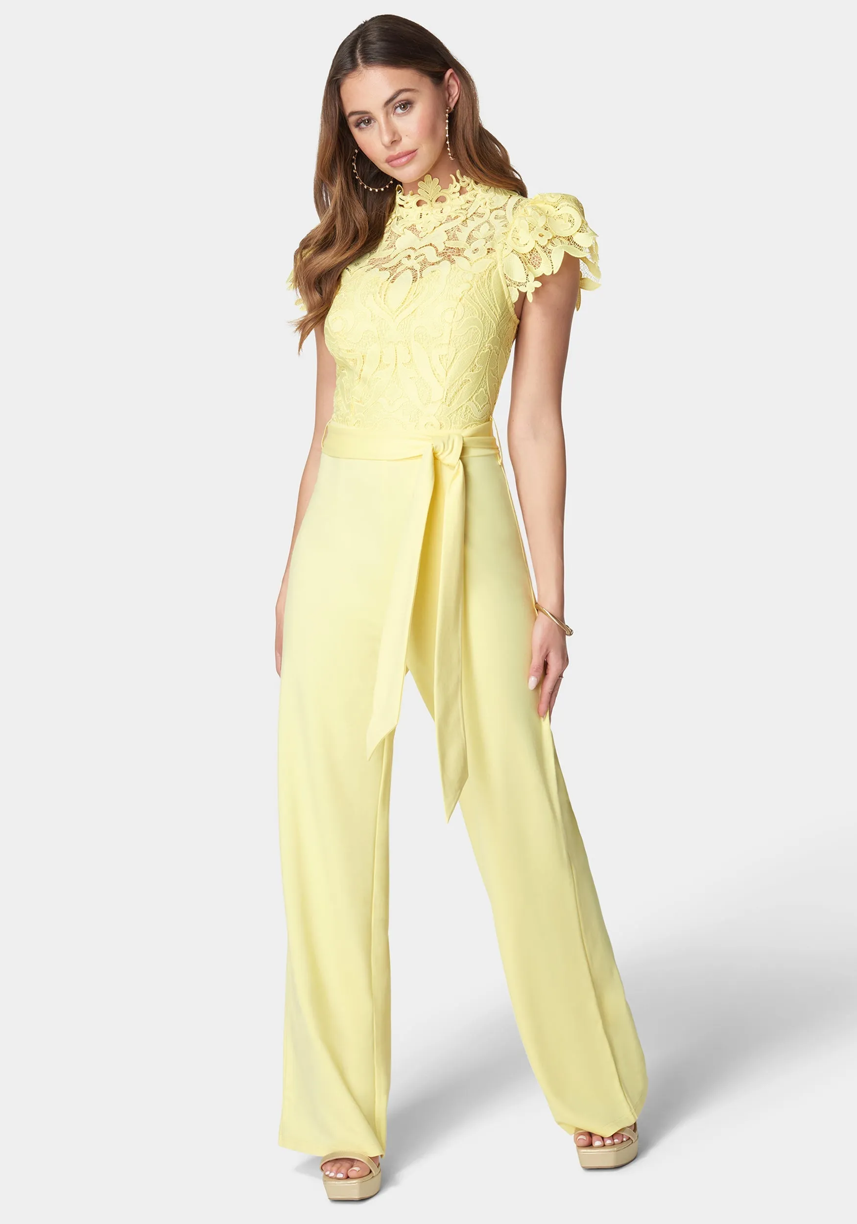 Lace High Neck Jumpsuit sold by Bebe