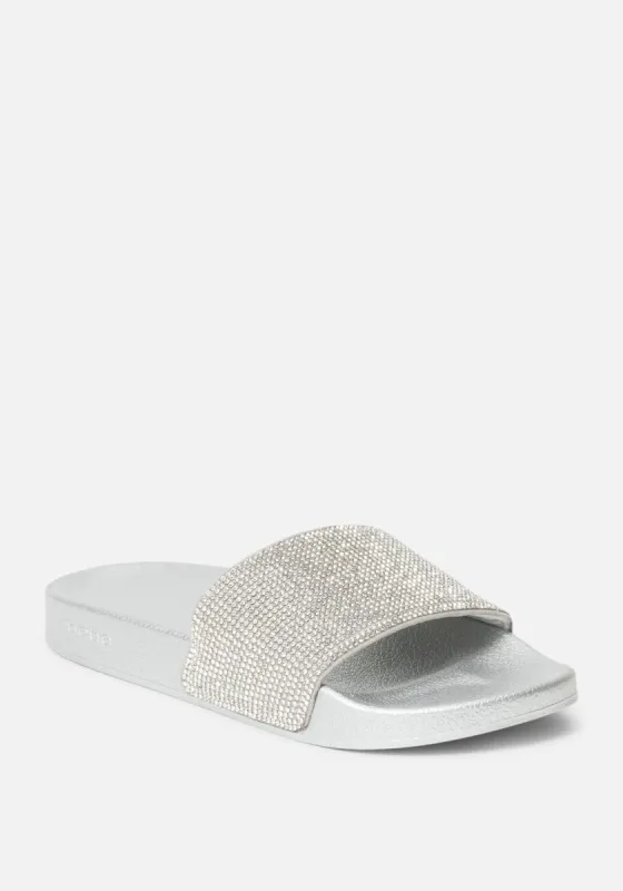 Fonda Studded Slides sold by Bebe