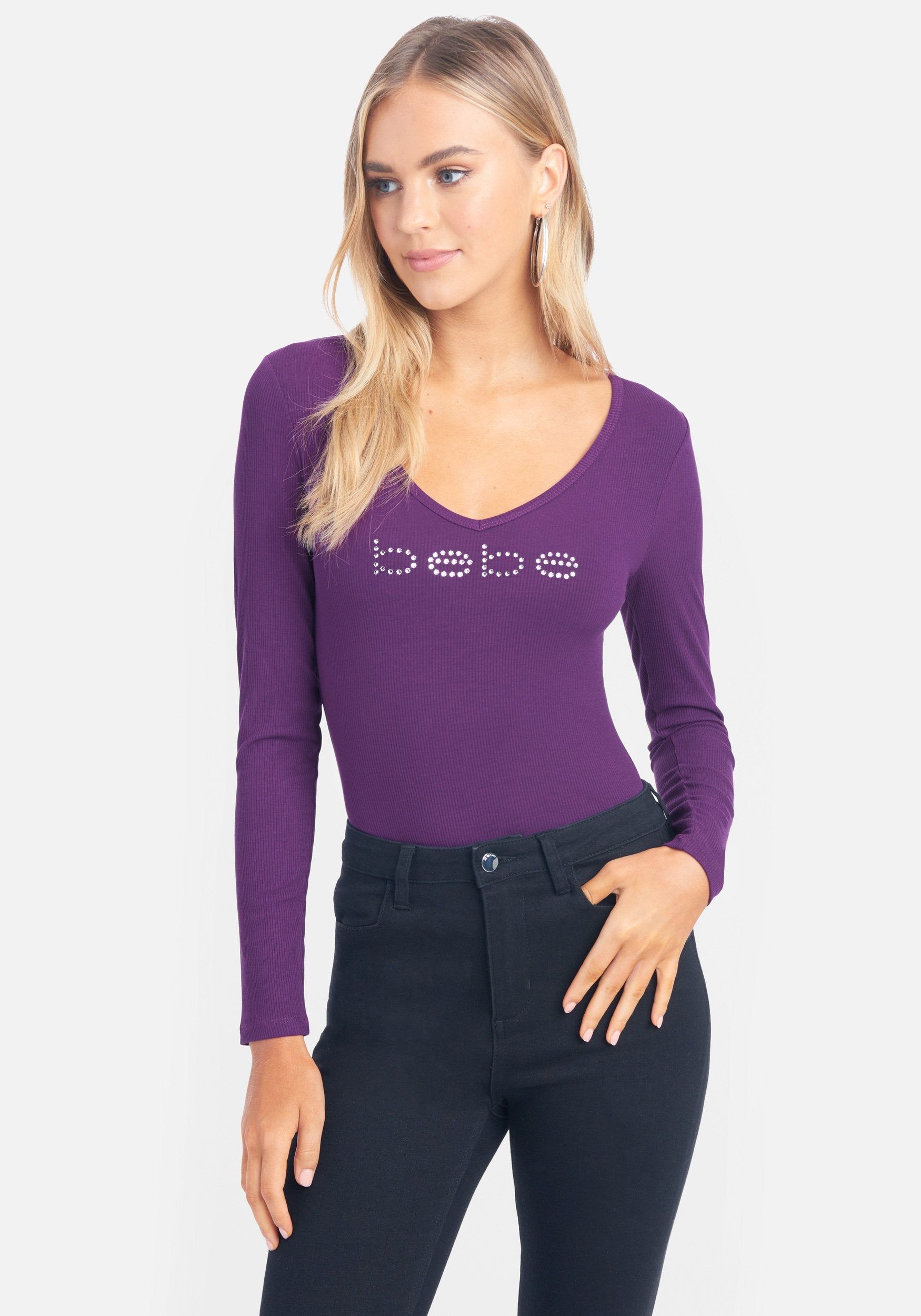 Crystal Logo V-Neck Long Sleeve Tee sold by Bebe