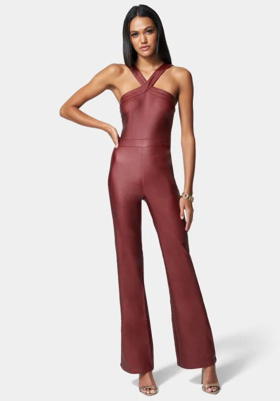 Wide Leg Snap Detail Coated Denim Jumpsuit sold by Bebe