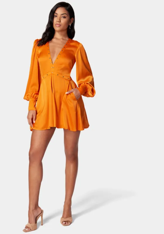 Satin Eyelet Detail Romper sold by Bebe