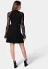 Lace Bell Sleeve Cutout Dress sold by Bebe