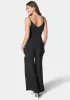High Slit V-Neck Cami Strap Jumpsuit sold by Bebe