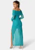 Off Shoulder Asymmetrical Mesh Gown sold by Bebe