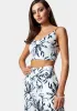 Reversible Satin Chain Strap Lace Up Back Top sold by Bebe
