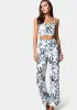 Reversible Satin Chain Strap Lace Up Back Top sold by Bebe