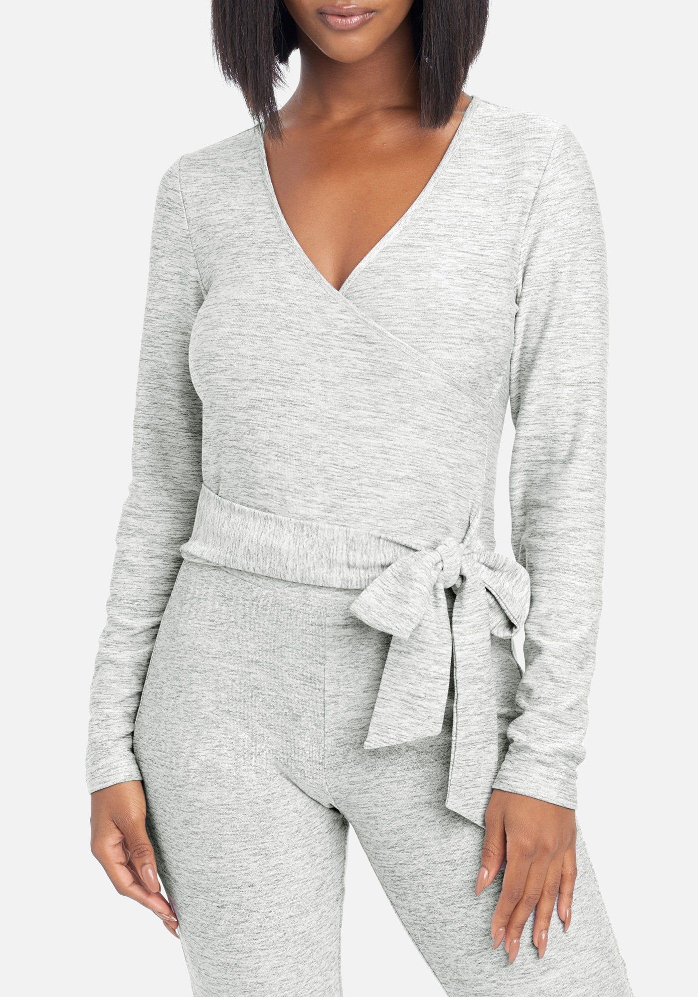 Surplice Warp Around Top sold by Bebe