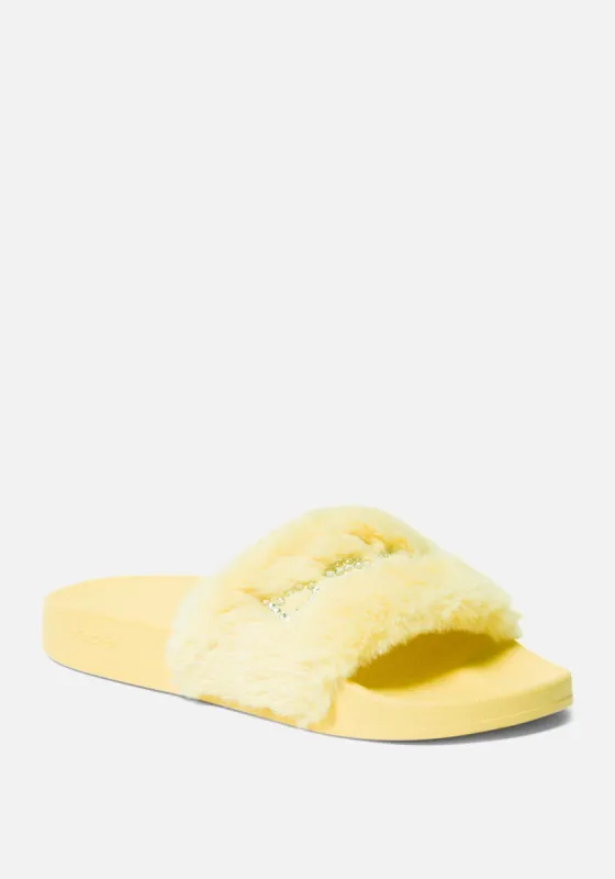 Furiosa Faux Fur Slides sold by Bebe