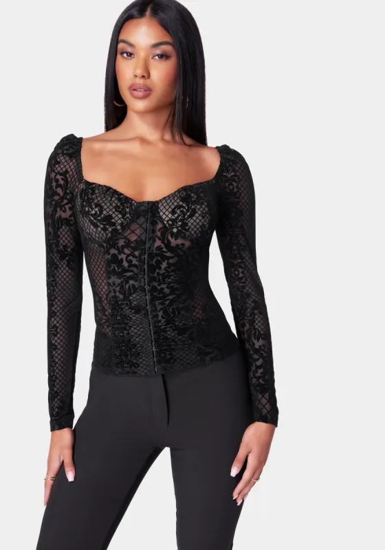 Flocked Burnout Long Sleeve Top sold by Bebe