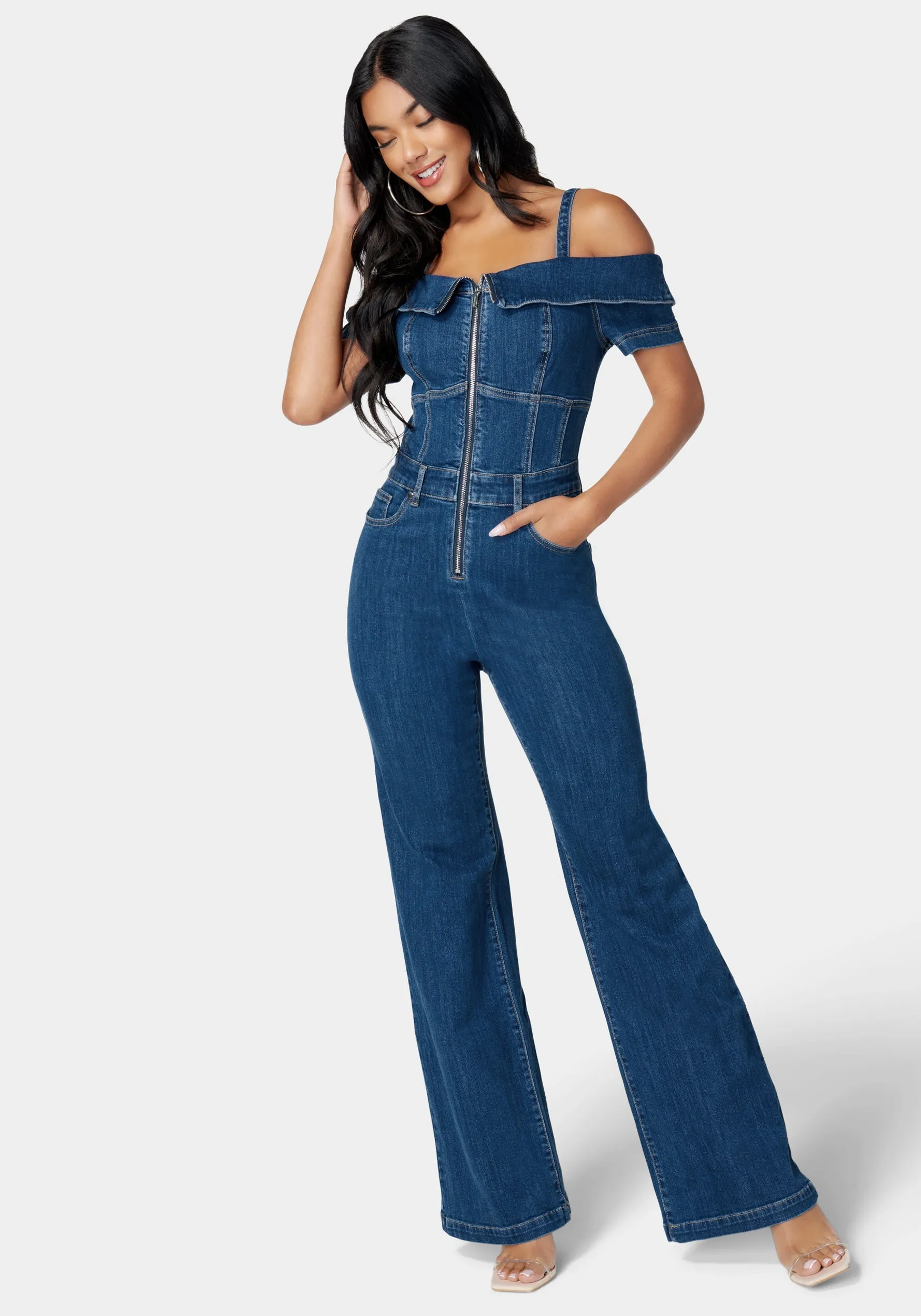 Off Shoulder Zip Front Wide Leg Denim Jumpsuit sold by Bebe