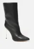 Vanila Mid High Booties sold by Bebe