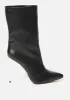 Vanila Mid High Booties sold by Bebe