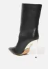 Vanila Mid High Booties sold by Bebe