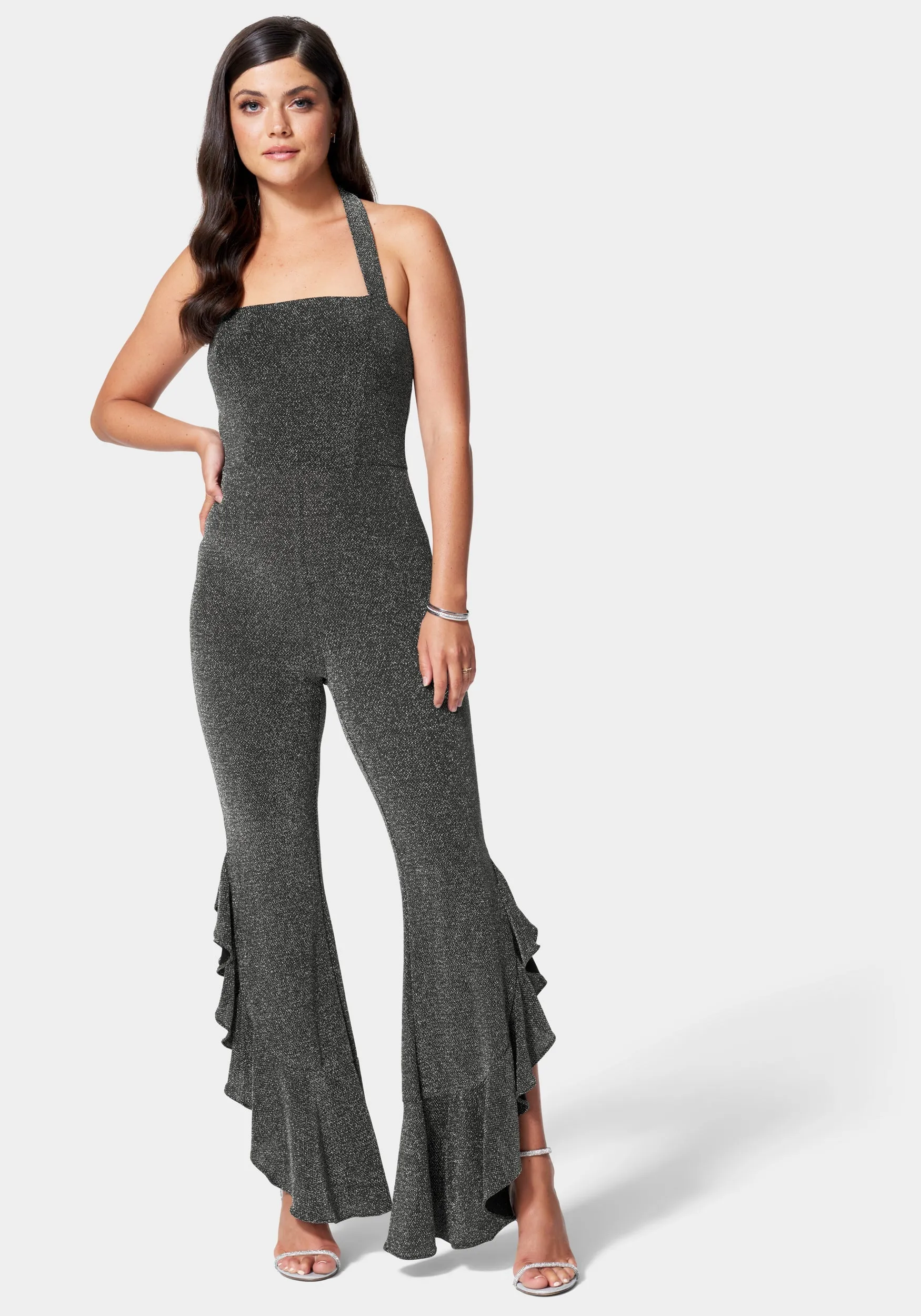 Glitter Knit Ruffle Leg Jumpsuit sold by Bebe
